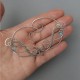 Nausznice z drutu błękitny topaz wire wrapping